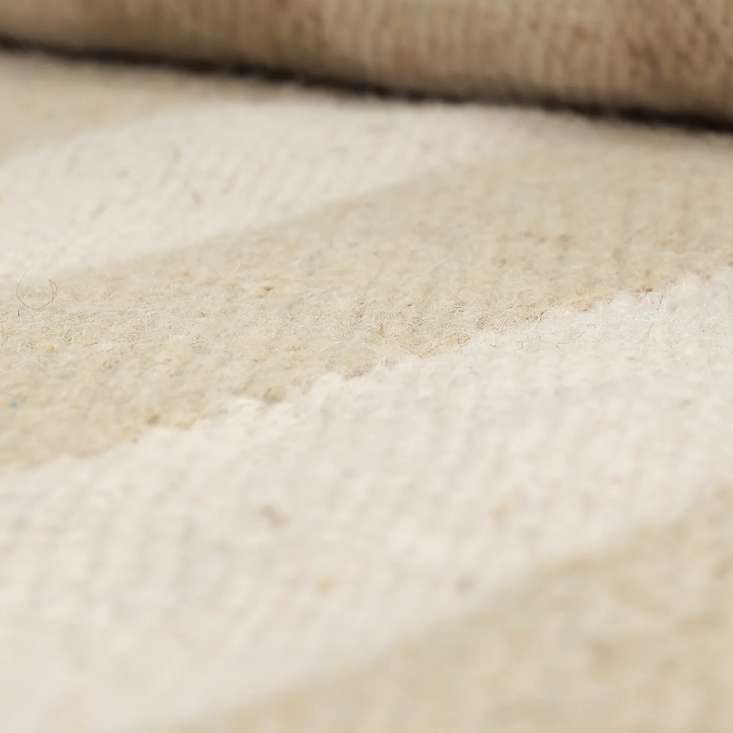 Unregelmäßiger Wollteppich - Kystaro (creme/beige)